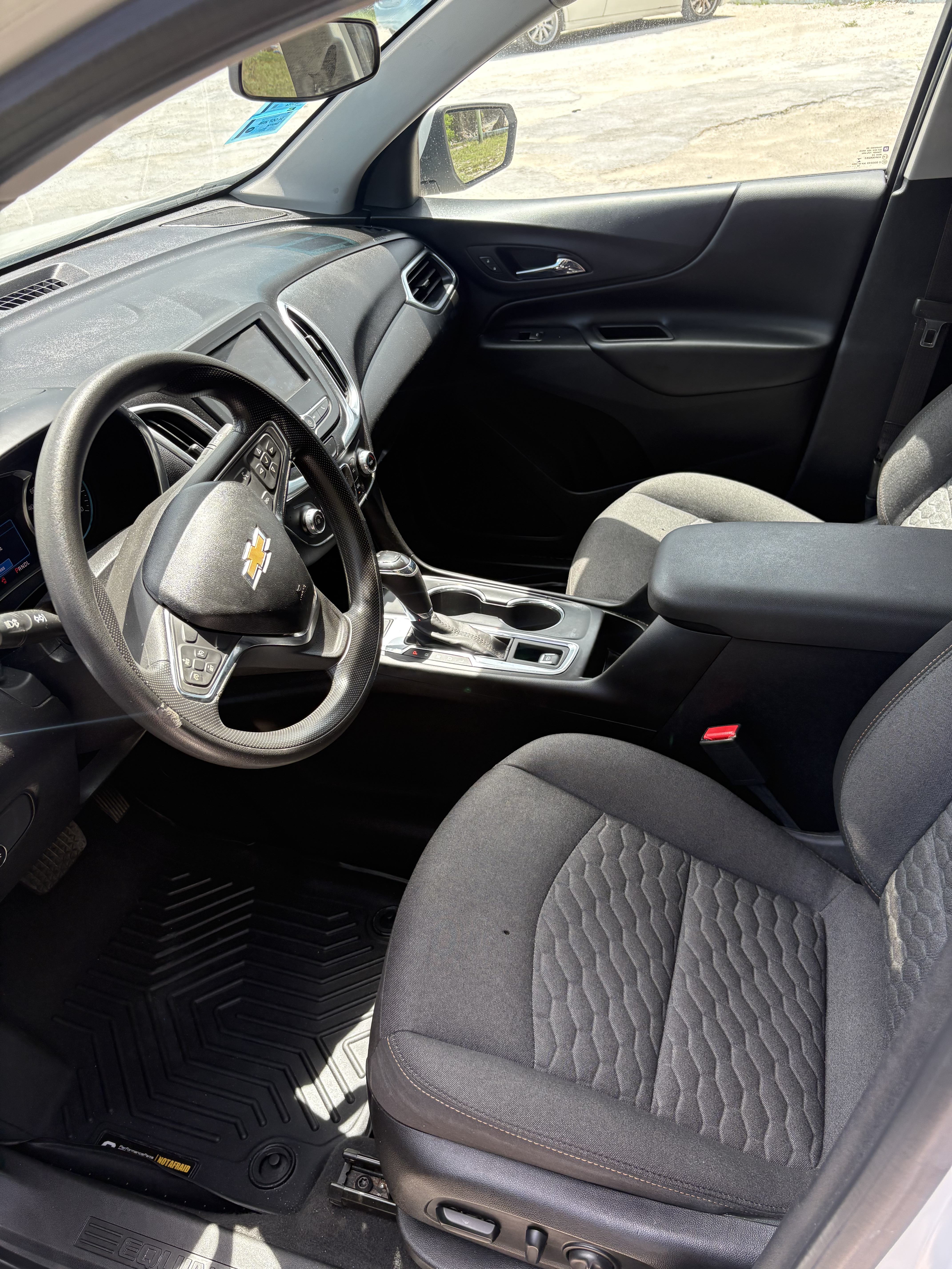 Front seats and dashboard from the passenger side